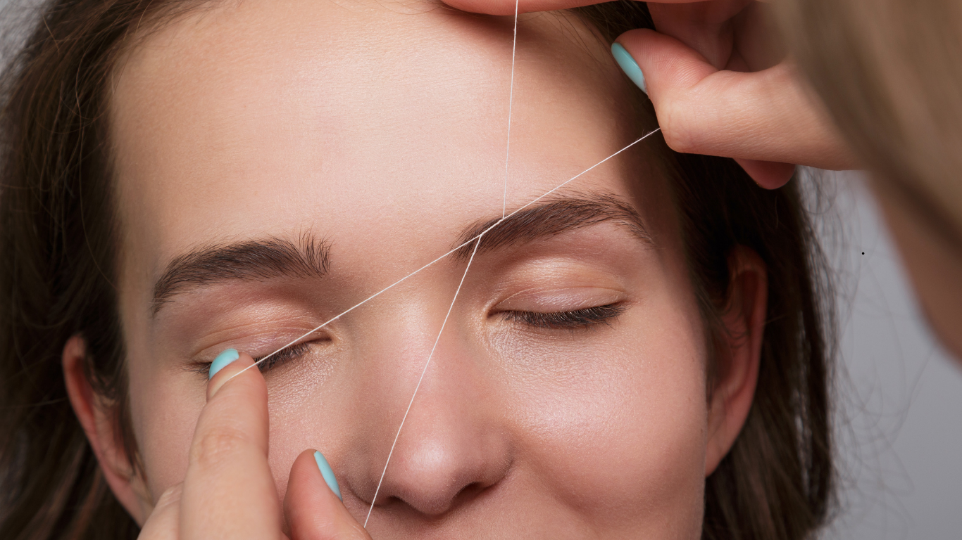 Natural eyebrow shaping using threading