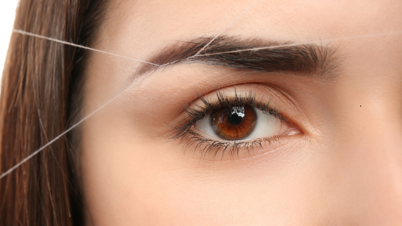Eyebrow threading for sharp brow shape