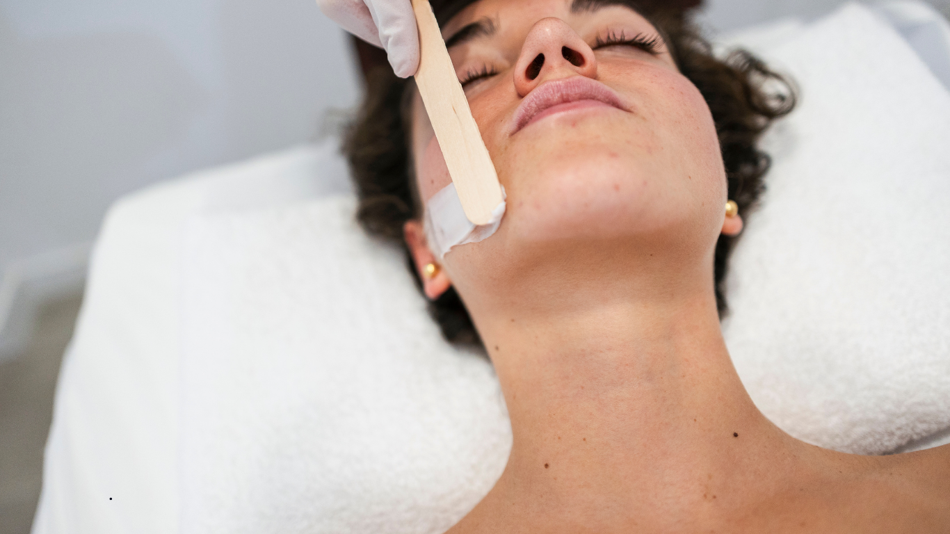 Deep cleansing facial treatment in progress